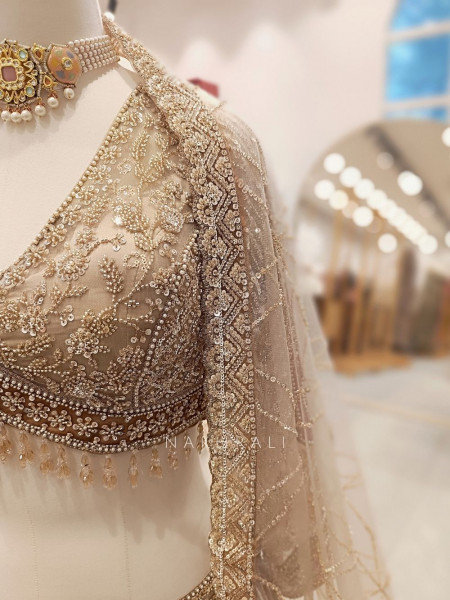 Seraphine Beige Lehenga Set with Zari and Sequin Work