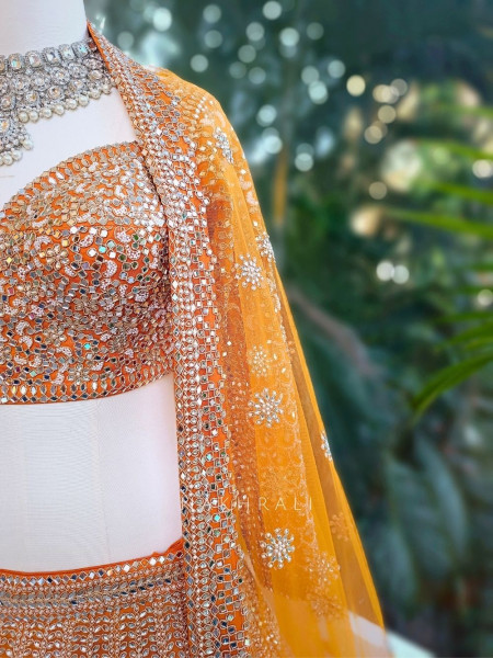 Sitara Orange Net Lehenga with Mirror, Zari and Bead Embellishments