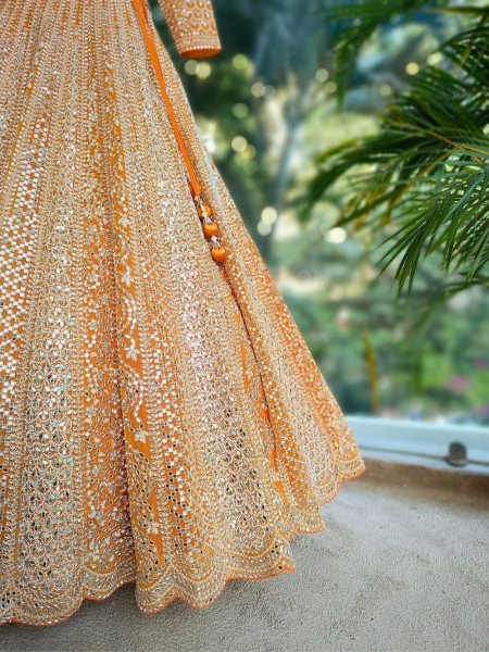 Sitara Orange Net Lehenga with Mirror, Zari and Bead Embellishments