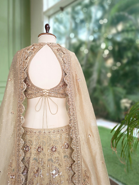 Tvarika Beige Tissue Organza Bridal Lehenga With Zardozi Tilla & Scalloped Work