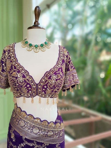 Tarangini Purple Banarasi Silk Blend Saree with Readymade Blouse