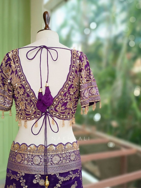 Tarangini Purple Banarasi Silk Blend Saree with Readymade Blouse