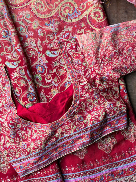 Paisley Printed Red Saree with Stone Embellished Readymade Blouse