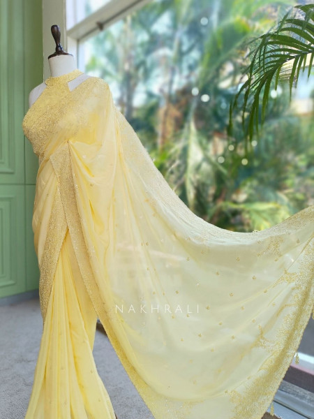 Oshni Yellow Saree with Readymade Halter Blouse
