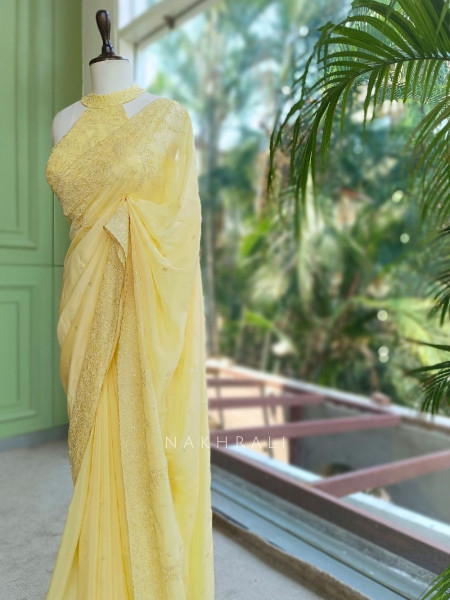Oshni Yellow Saree with Readymade Halter Blouse