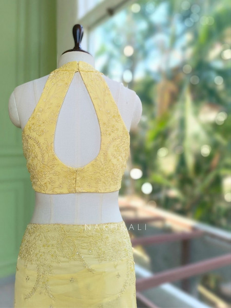 Oshni Yellow Saree with Readymade Halter Blouse