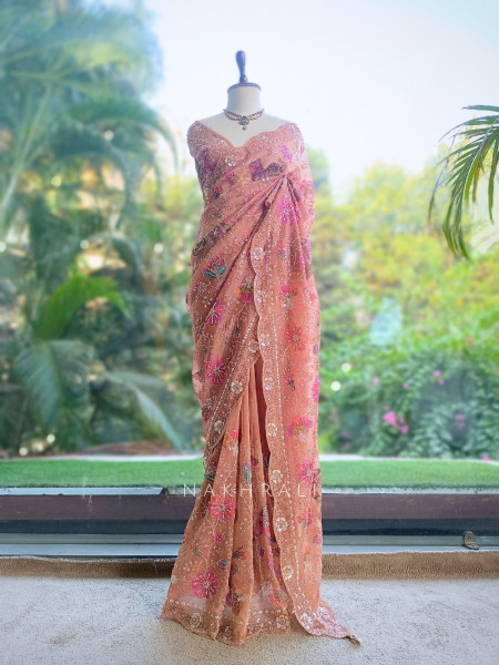 Noor-e-Afsanah Peach Organza Saree with Royal Elephant Motifs