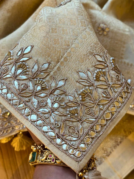 Varnika Cream Banarasi Saree with Gota Border