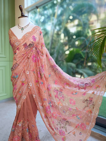 Noor-e-Afsanah Peach Organza Saree with Royal Elephant Motifs