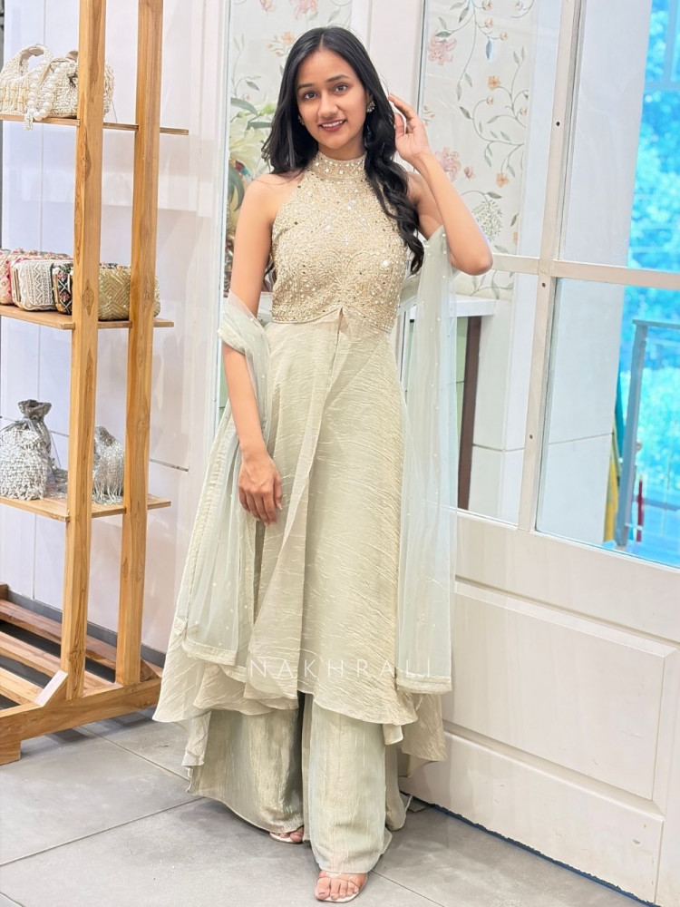 Image of Andaaz Pista Green Halter Neck Palazzo Set with Sequin Embroidery