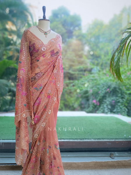 Noor-e-Afsanah Peach Organza Saree with Royal Elephant Motifs