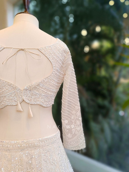 Divyana White Lehenga Set with Sequin Cut Dana Work