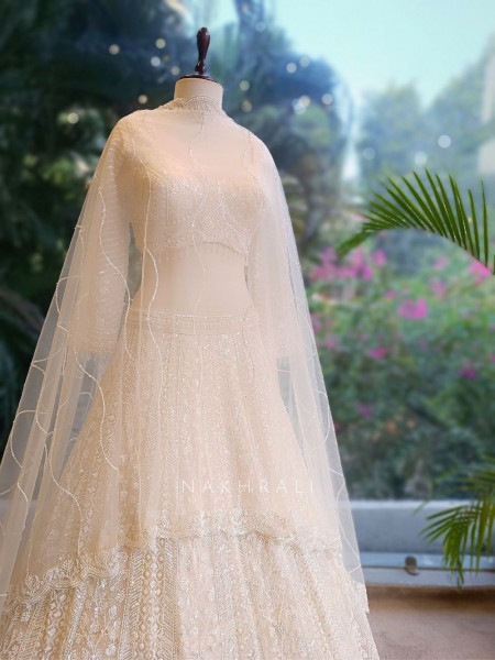 Divyana White Lehenga Set with Sequin Cut Dana Work