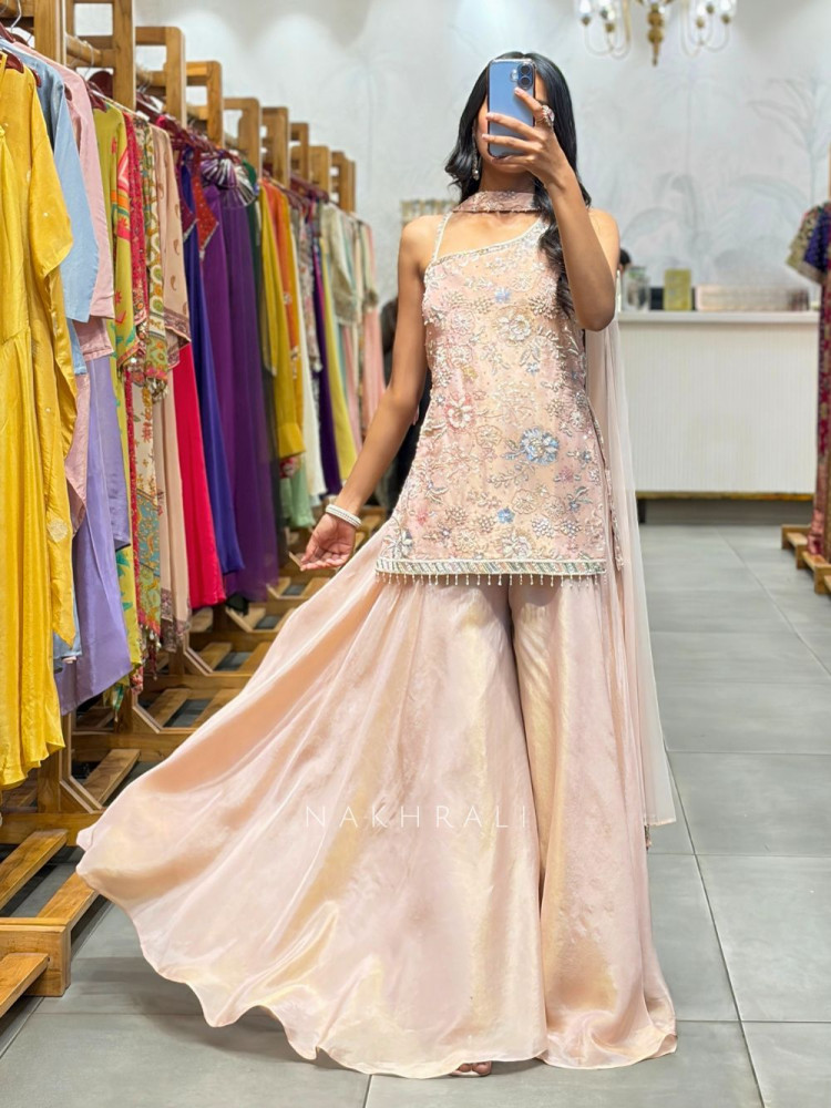 Image of Noirvi Peach Chinon Kurta Palazzo Set with Cut Dana Sequin Work