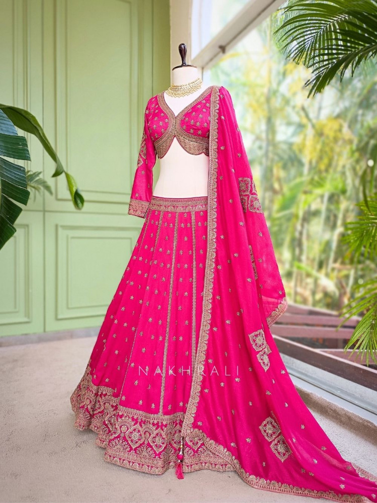 Image of Toshika magenta Lehenga Set with Detailed Embroidery Work