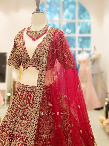 Aarini Maroon Velvet Bridal Lehenga with Zardozi Embroidery