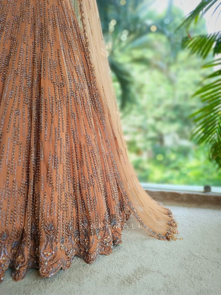 Amber Glow Net Bridal Indo-Western Lehenga with Sequin Embroidery