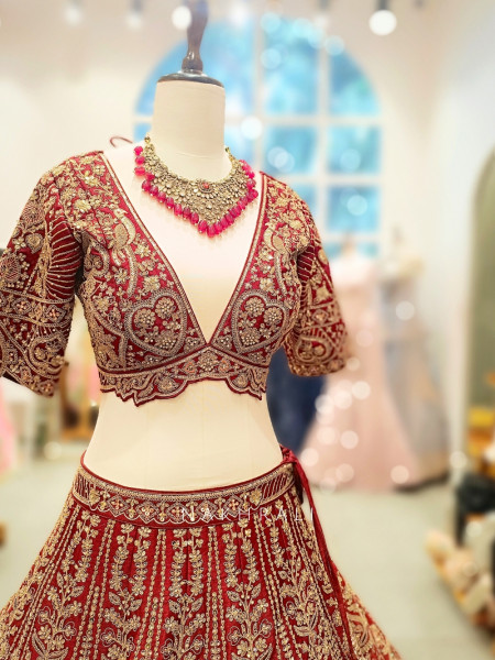Aarini Maroon Velvet Bridal Lehenga with Zardozi Embroidery