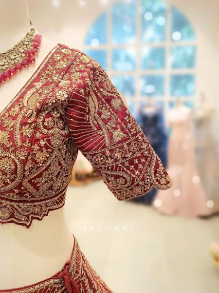Aarini Maroon Velvet Bridal Lehenga with Zardozi Embroidery
