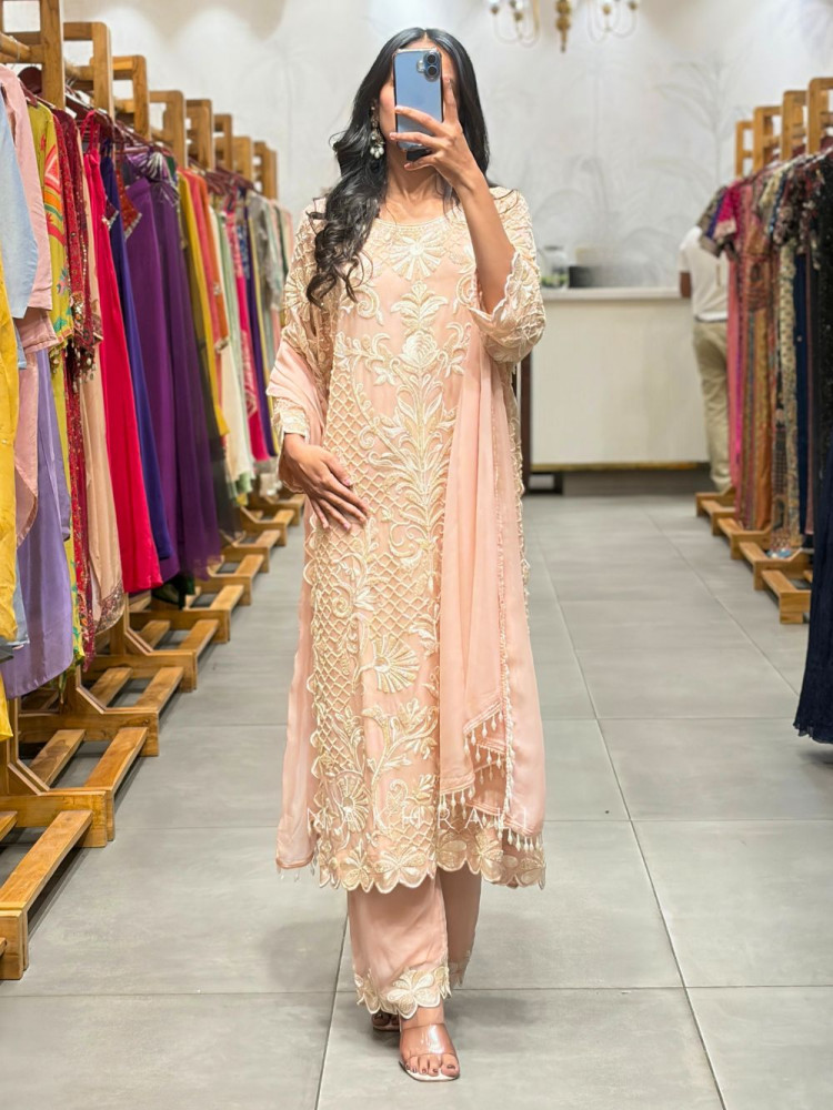 Image of reevaya Peach Georgette Kurta Set with Thread Embroidery