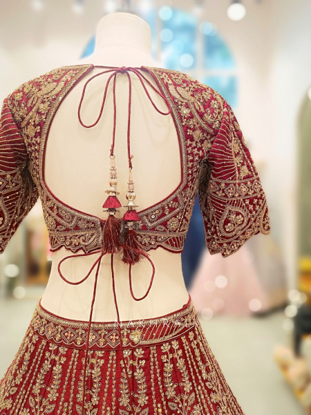 Aarini Maroon Velvet Bridal Lehenga with Zardozi Embroidery