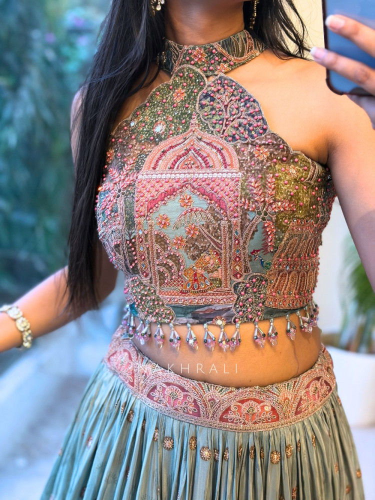 Image of Jharokha Tales Sea Green Lehenga with Pichwai-Inspired Embroidery
