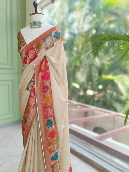 Ranjani Beige Saree with Multicolor Woven Border