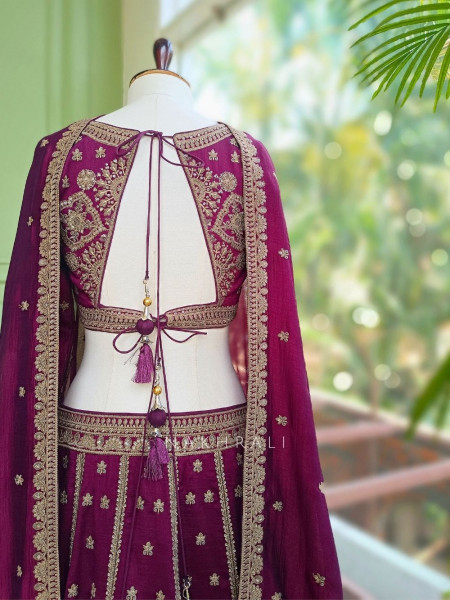 Toshika Wine Lehenga Set with Detailed Embroidery Work