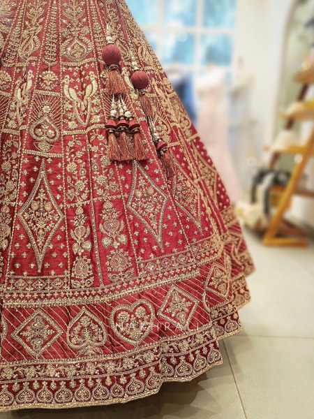 Aarini Maroon Velvet Bridal Lehenga with Zardozi Embroidery