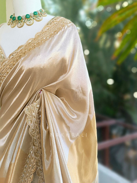 Aakarshana Golden Saree with Embroidered Border