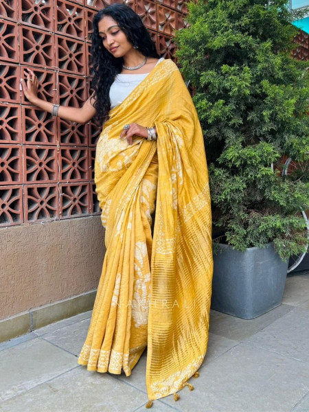 Shubhta Yellow Batik Printed Saree with Tassel Pallu
