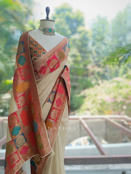 Ranjani Beige Saree with Multicolor Woven Border