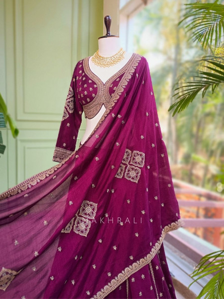 Toshika Wine Lehenga Set with Detailed Embroidery Work