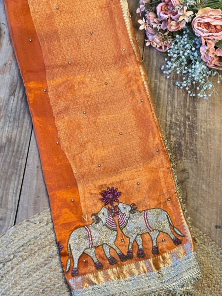 Vraj Ras Orange Banarasi Tissue Silk Saree – Hand Embroidery & Zari Border