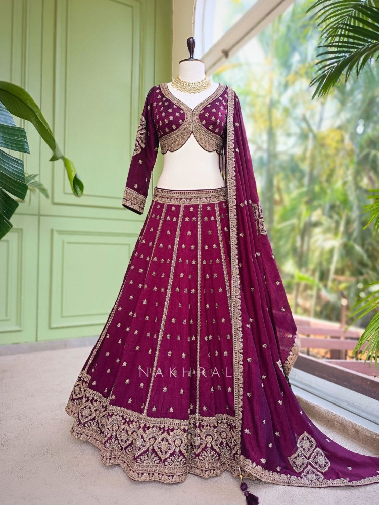 Image of Toshika Wine Lehenga Set with Detailed Embroidery Work