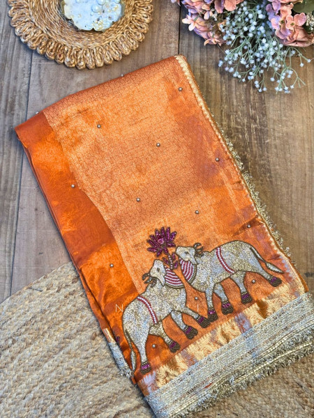 Vraj Ras Orange Banarasi Tissue Silk Saree – Hand Embroidery & Zari Border
