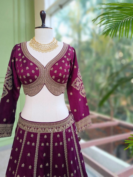 Toshika Wine Lehenga Set with Detailed Embroidery Work