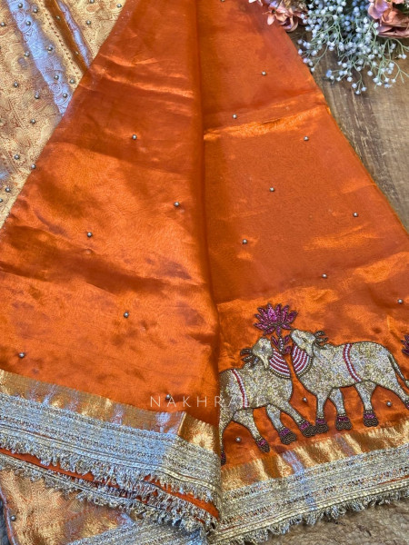 Vraj Ras Orange Banarasi Tissue Silk Saree – Hand Embroidery & Zari Border