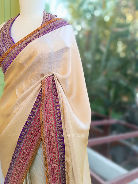 Nazara Off white Satin Saree with Embroidered Sequin Blouse