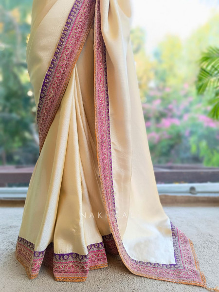 Nazara Off white Satin Saree with Embroidered Sequin Blouse