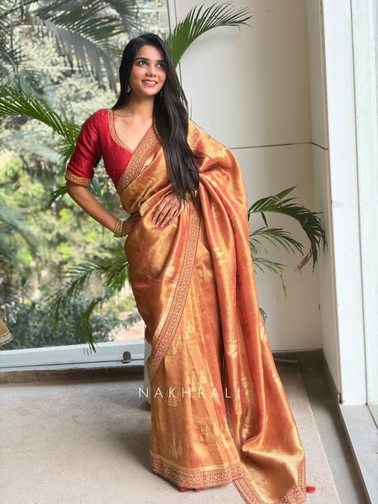 Image of Golden Peach Banarasi Saree with Zari Weave &amp; Embroidered Border