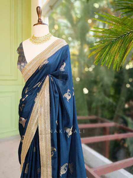 Tavira Teal Blue Saree with Broad Border and Unstitched Blouse Piece