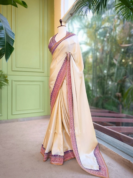 Nazara Off white Satin Saree with Embroidered Sequin Blouse