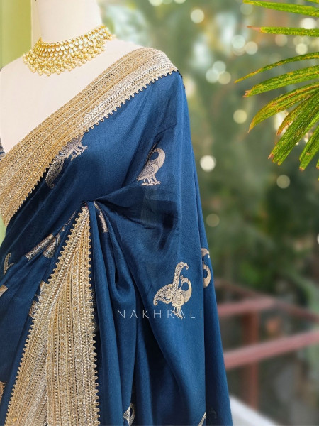 Tavira Teal Blue Saree with Broad Border and Unstitched Blouse Piece