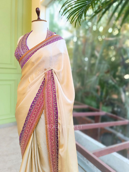 Nazara Off white Satin Saree with Embroidered Sequin Blouse