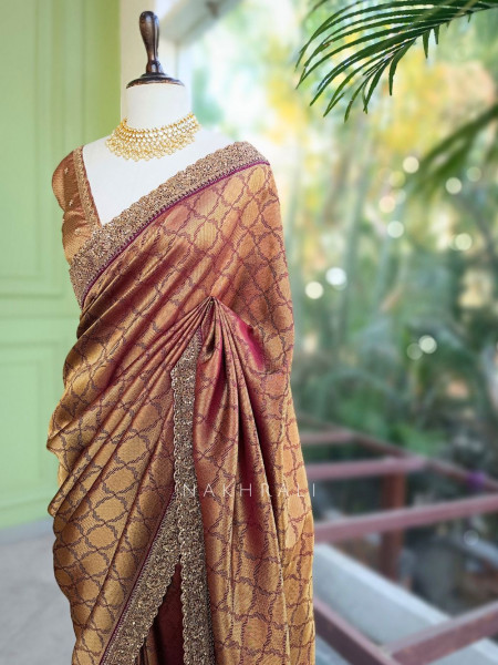 Shwetambari Wine Silk Saree with Zari Woven Pattern