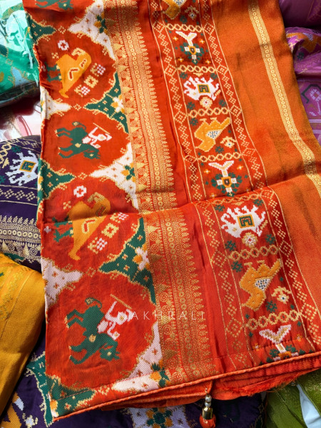 Kalyani Plum Orange  Patola Saree With With Running Blouse Piece