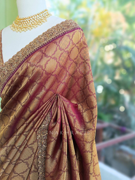 Shwetambari Wine Silk Saree with Zari Woven Pattern