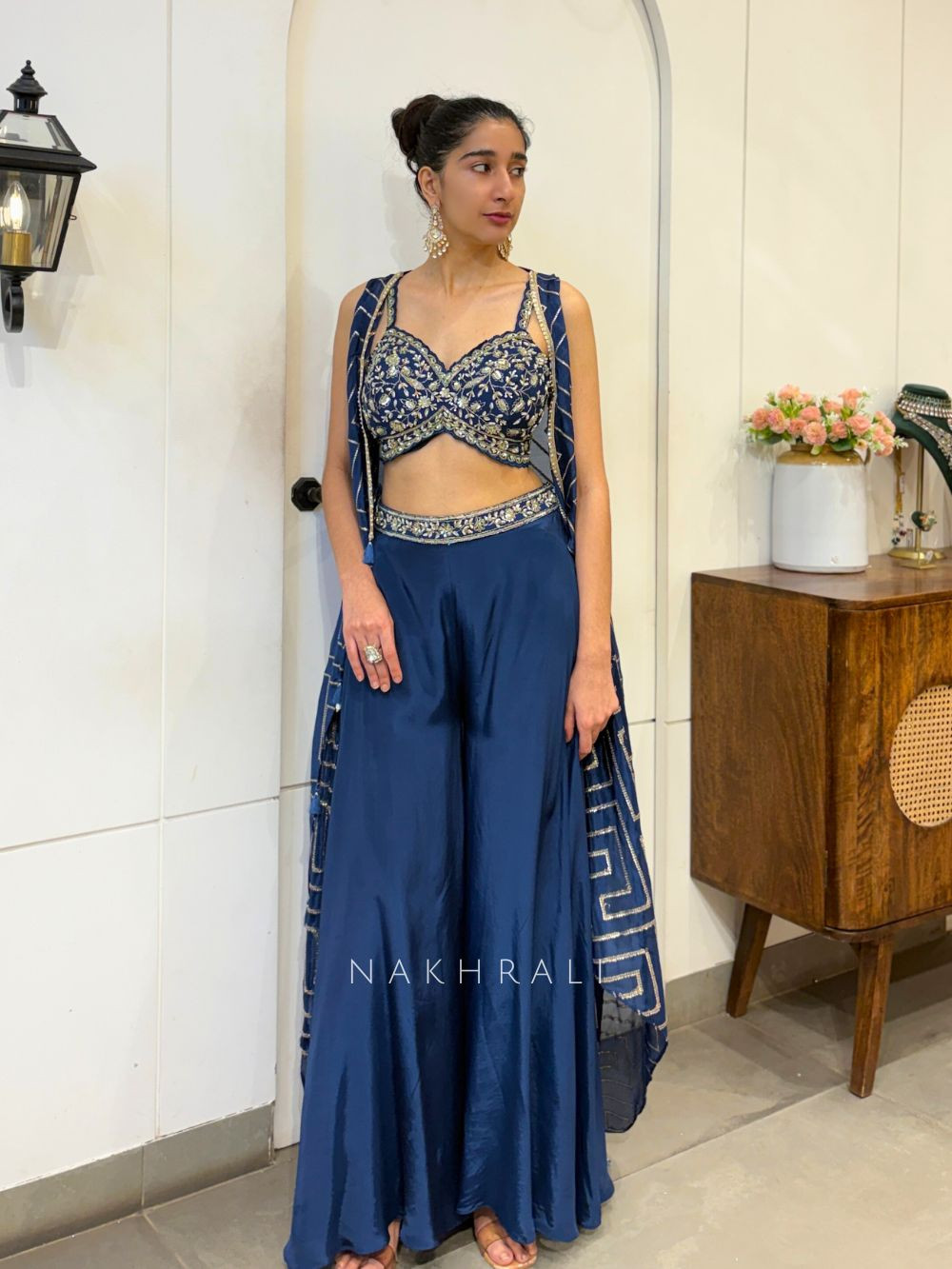 Nirvika Navy Blue Embroidered Crop Top Palazzo Set with Shrug Nirvika Navy Blue Embroidered Crop Top Palazzo Set with Shrug