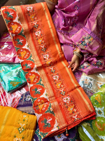 Kalyani Plum Orange  Patola Saree With With Running Blouse Piece